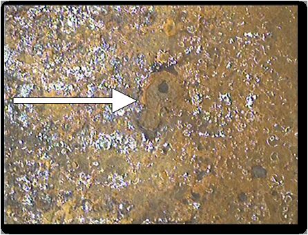 Camera inspection view showing corrosion inside a pipe