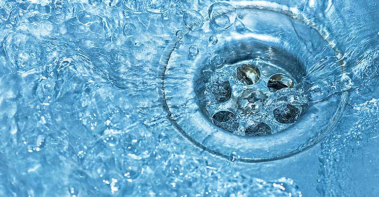 Professional drain-cleaning equipment used to clear a plumbing blockage